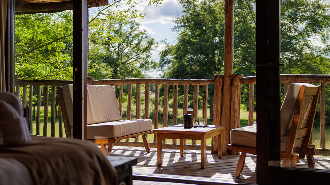Enjoy a magnificent master bedroom with a breathtaking view of the savannah