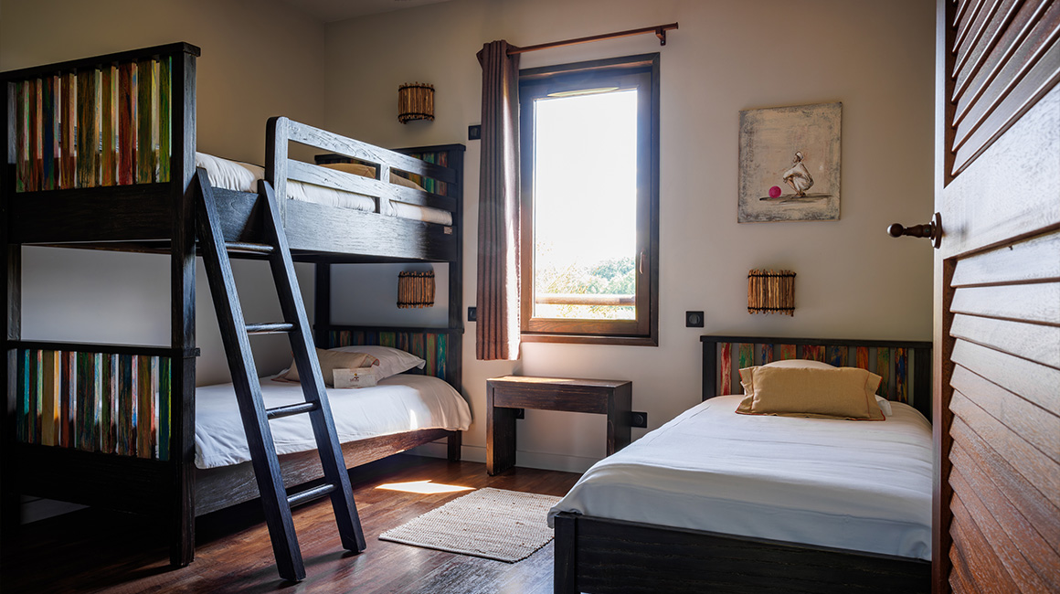 Enjoy a family room with a view of the African savannah